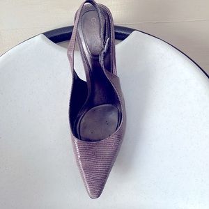 CK Sling back heels in lizard print, with adjustable strap on the side.